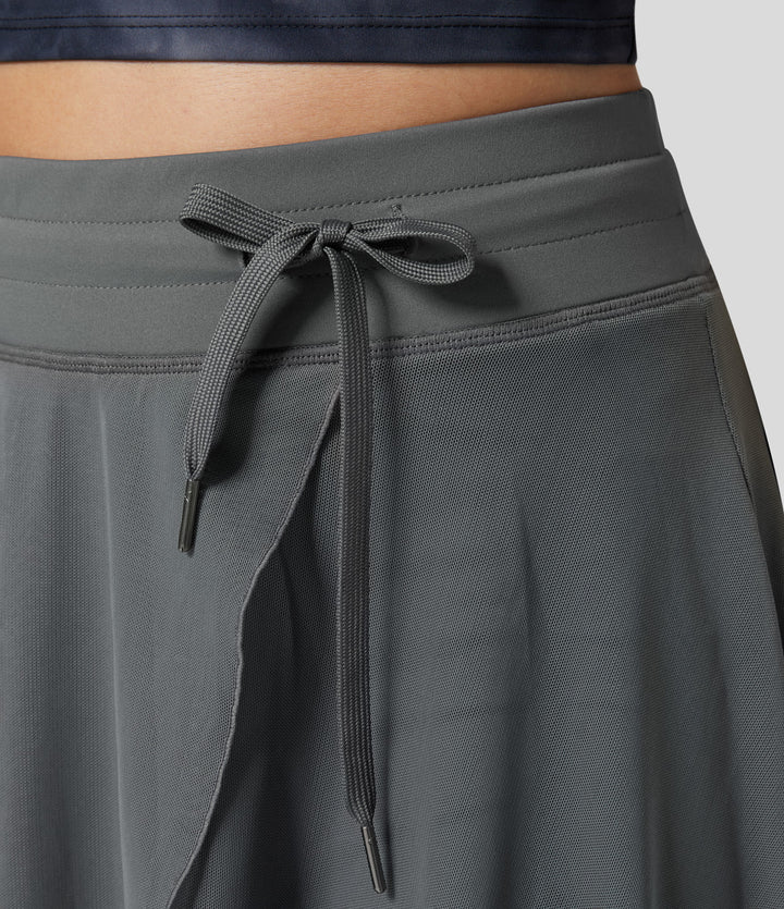 Litvia – Timeless Midi Skirt Elegance with a Playful Touch