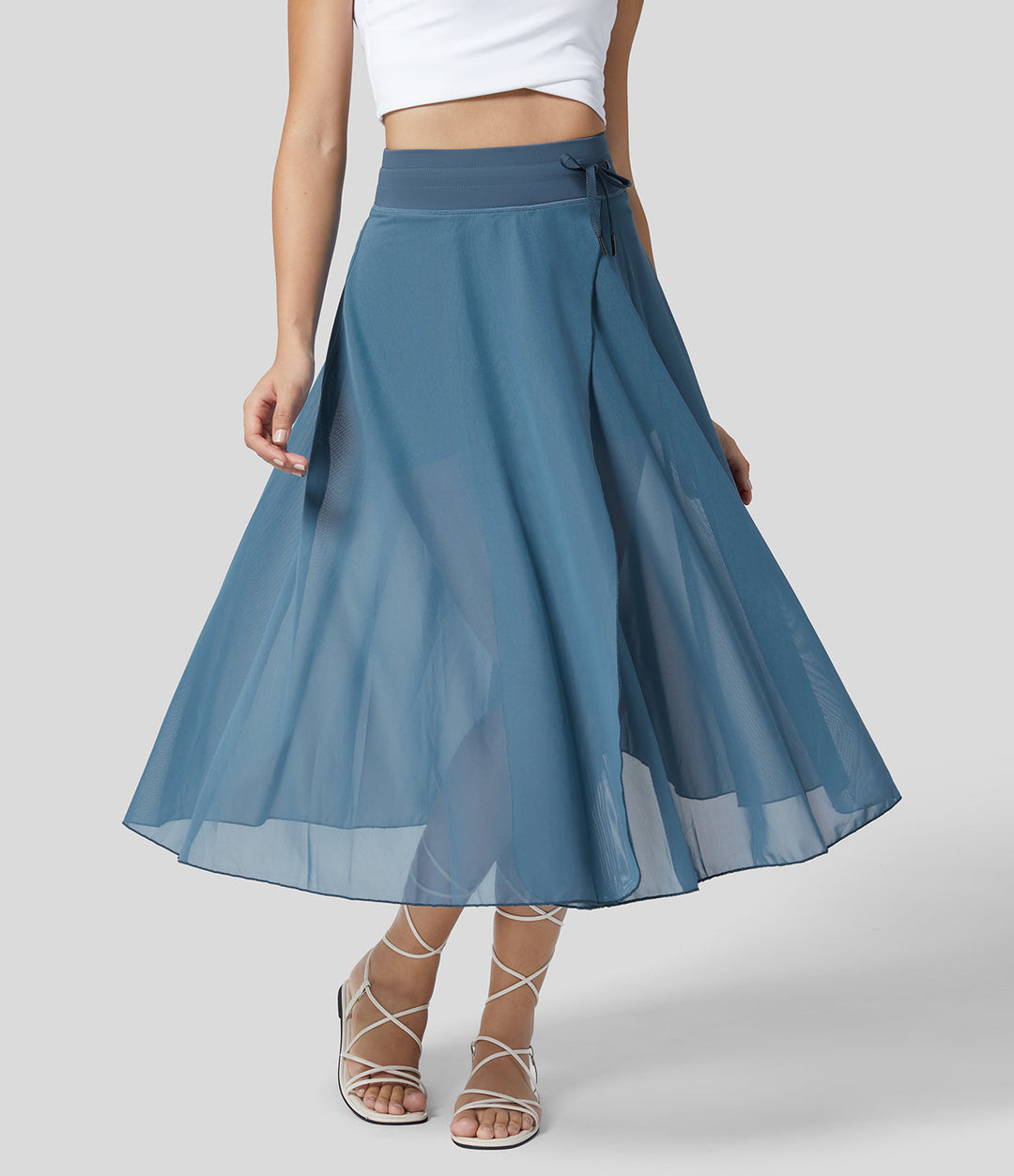 Litvia – Timeless Midi Skirt Elegance with a Playful Touch