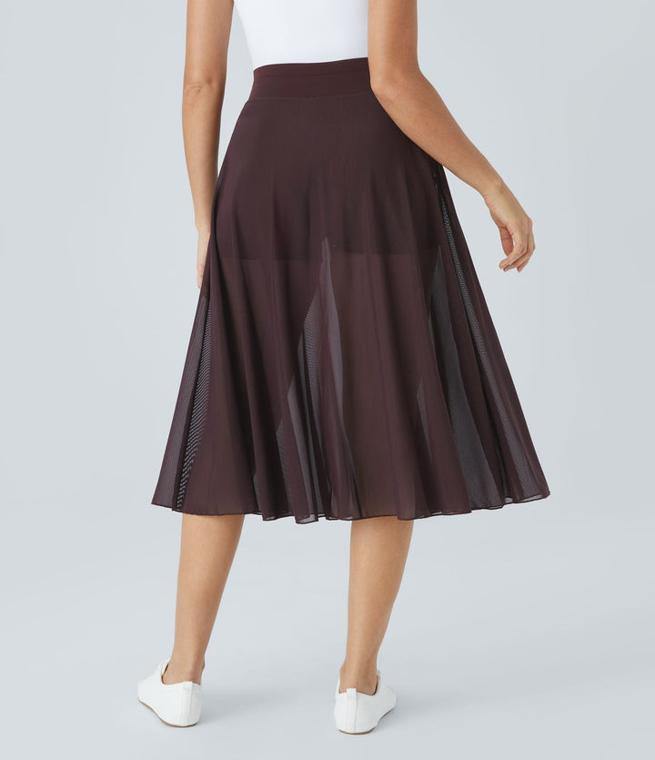 Litvia – Timeless Midi Skirt Elegance with a Playful Touch