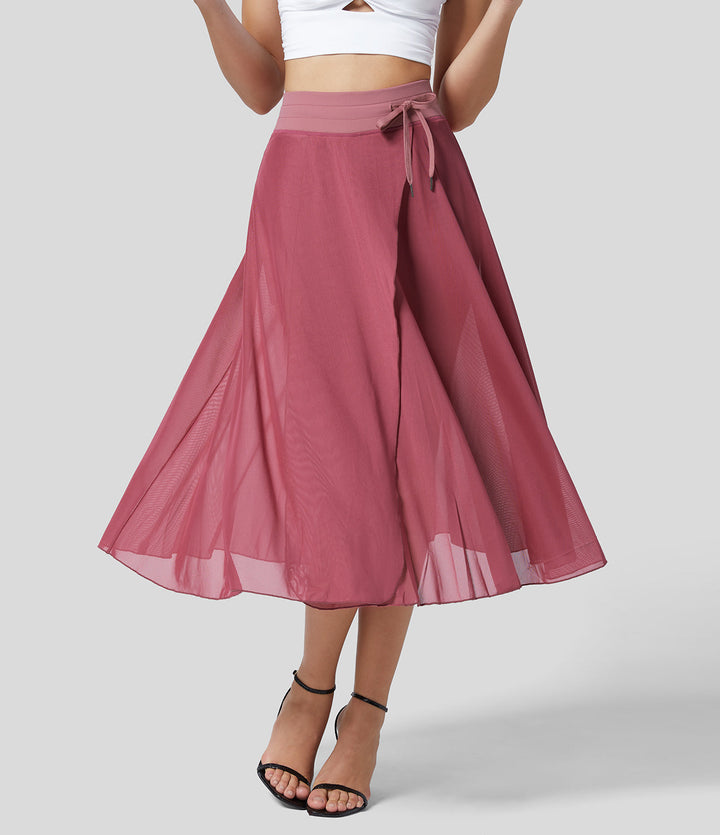 Litvia – Timeless Midi Skirt Elegance with a Playful Touch