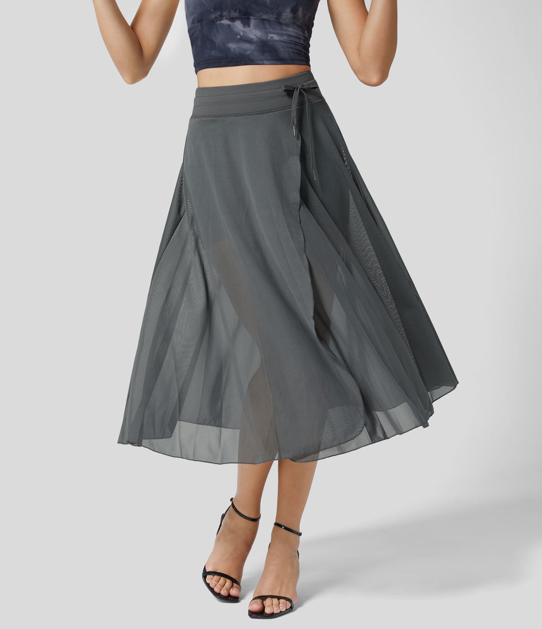 Litvia – Timeless Midi Skirt Elegance with a Playful Touch