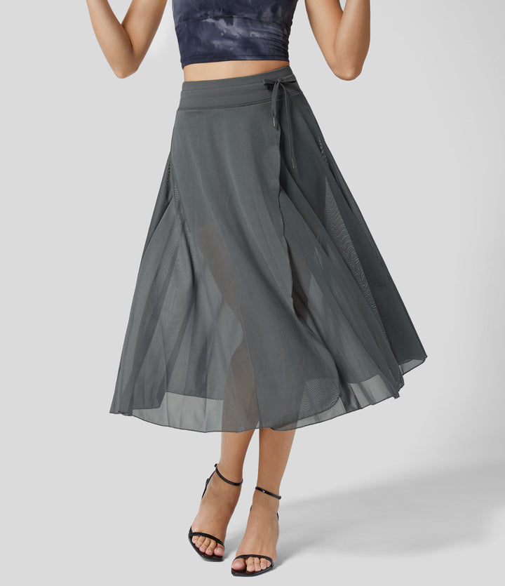 Litvia – Timeless Midi Skirt Elegance with a Playful Touch