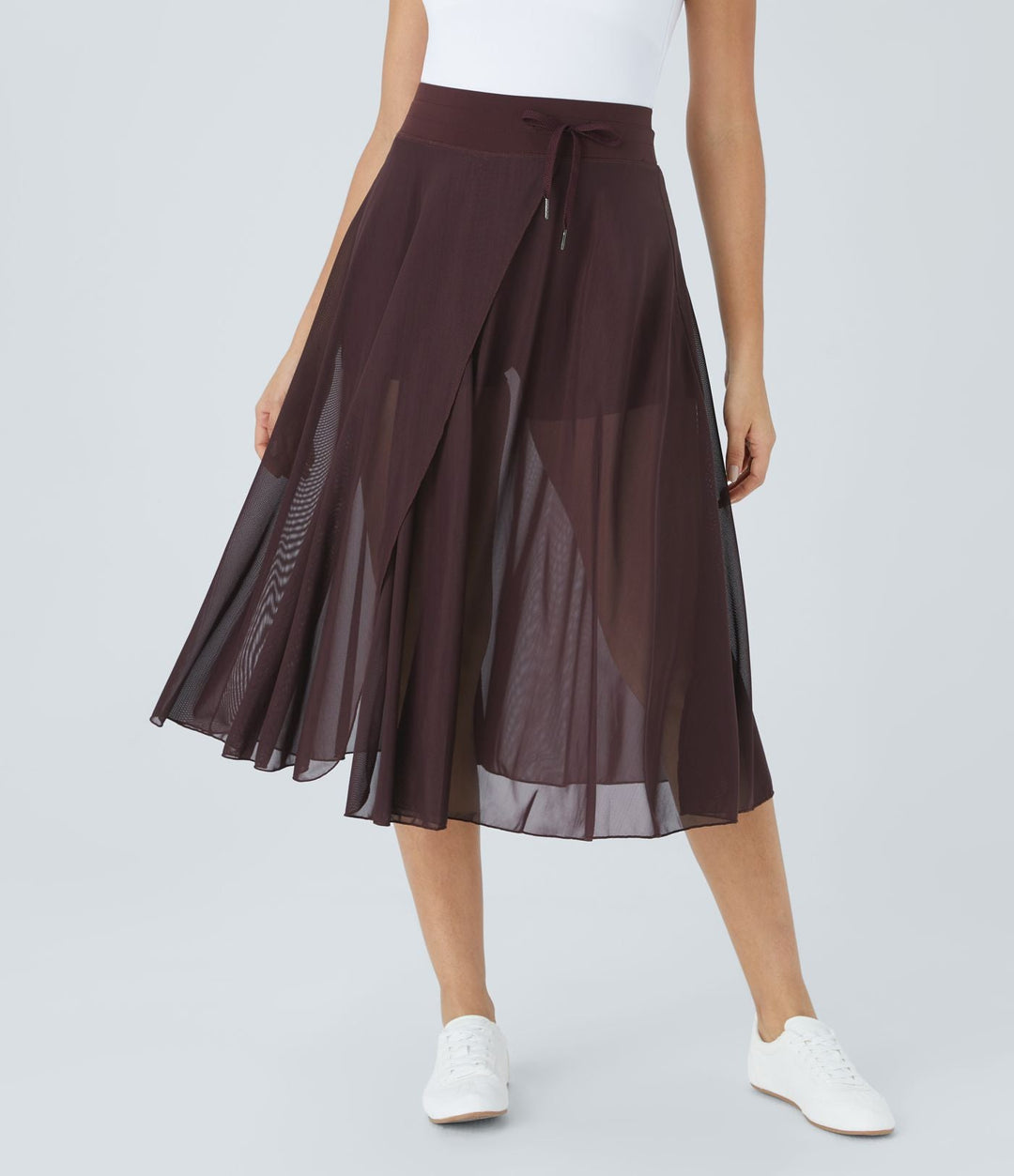 Litvia – Timeless Midi Skirt Elegance with a Playful Touch
